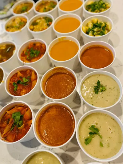 Tray of individually cupped salsas, sauces and cremas