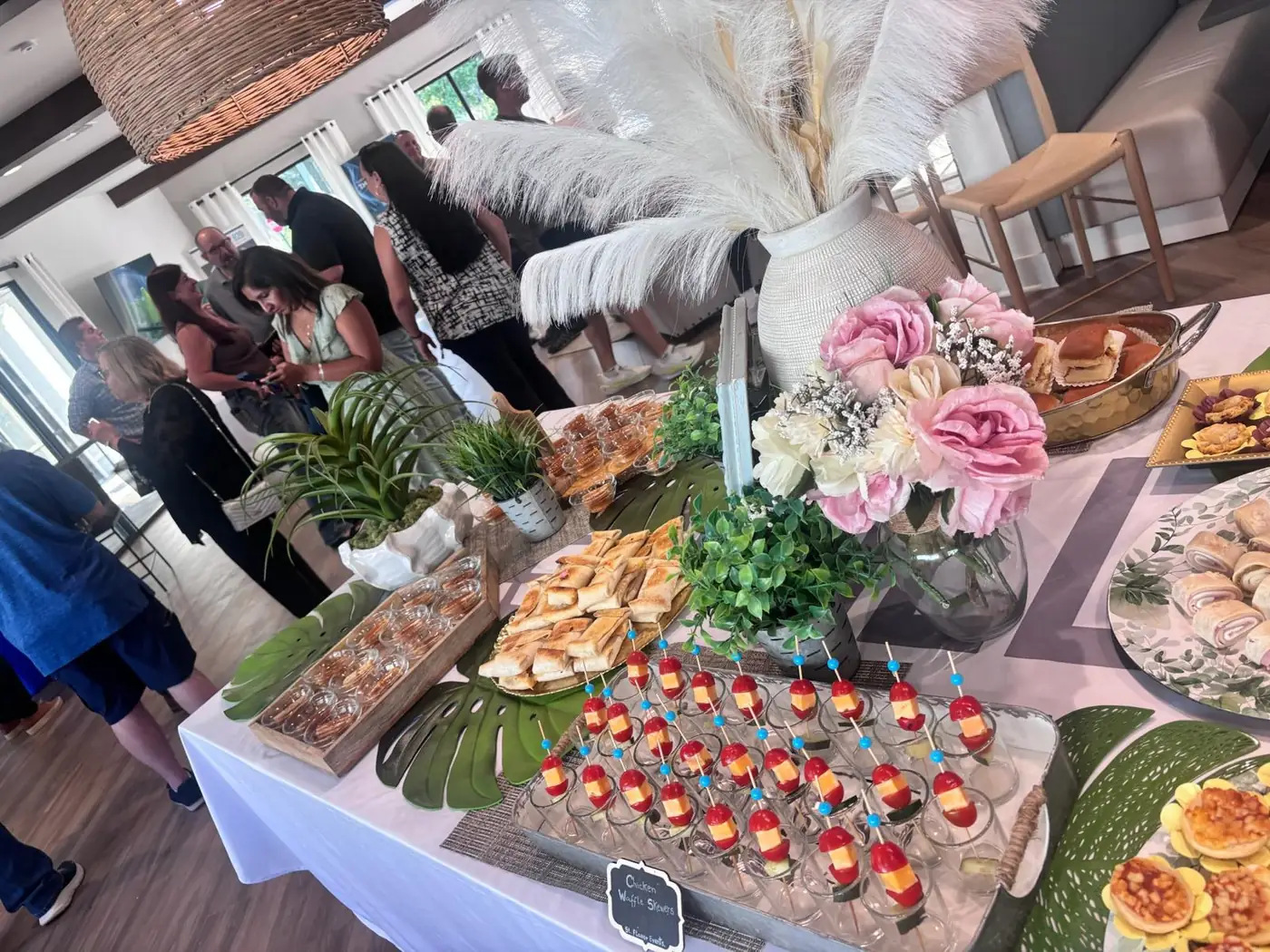 Guests at a catered social gathering
